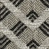 Woven chevron texture in beige, black, and white tones with a dense, jagged zigzag pattern and a slightly raised, knit surface.